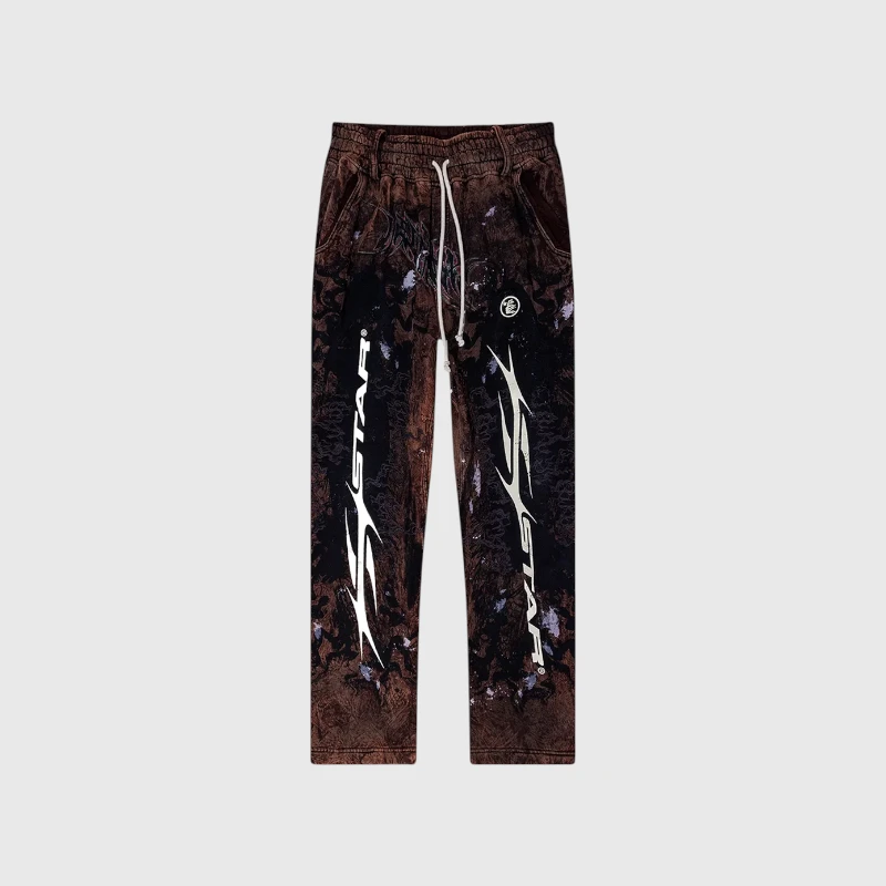 Hellstar Graffiti Sweatpant Brown Front View Hellstar Graffiti Sweatpants in brown featuring signature streetwear graphics and a vintage pigment-washed finish.