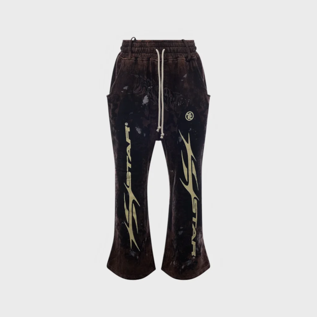 Hellstar Graffiti Sweatpants in brown featuring distressed fabric, drawstring waist, and iconic graphic screen prints.