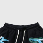 Black Hellstar Graffiti Washed Shorts with a comfortable drawstring waistband and unique urban street graphic design.