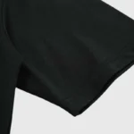 Close-up view of the high-quality black cotton fabric on a premium Hellstar graphic t-shirt for streetwear fans.