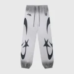 Hellstar gray sweatpants featuring a bold black graphic print, drawstring waist, and stylish urban streetwear design.