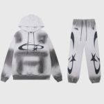 Gray Hellstar tracksuit featuring a cozy hooded sweatshirt and matching graphic print joggers for streetwear style.
