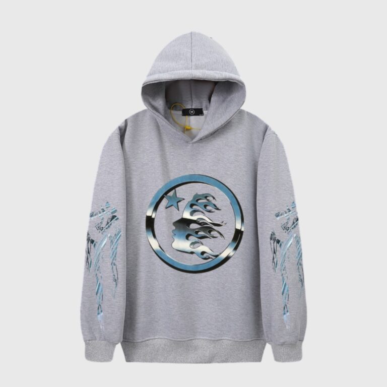 Hellstar grey graphic hoodie featuring a metallic blue star and flame circular design on the front and sleeves.