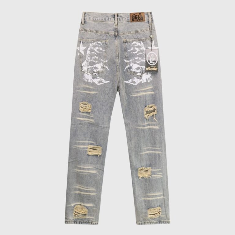 Back view of Hellstar premium vintage washed grey denim jeans with distressed detailing and signature graphic screen print.