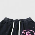Close-up view of the elastic waistband and white drawstring on the black Hellstar Guts Glory fleece sweatpants.