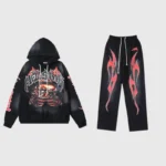 A black Hellstar Halloween skeleton airbrush tracksuit featuring a graphic hoodie and matching drawstring sweatpants.