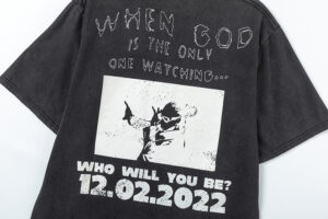 Back view of the Hellstar Heroes Villains black graphic t-shirt featuring the quote When God Is The Only One Watching