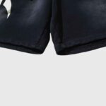 Premium black Hellstar Hstar shorts featuring a vintage washed fleece fabric design for a relaxed streetwear aesthetic.
