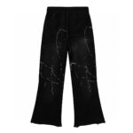 Back view of the black Hellstar Hstar tracksuit pants with a white distressed airbrush design detail.