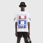 Front view of a model wearing the white Hellstar HStar Retro T-shirt featuring a large blue and red graphic print.