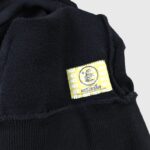Hellstar If You Don’t Like Us Beat Us tracksuit authentication tag detail on black cotton fabric.
