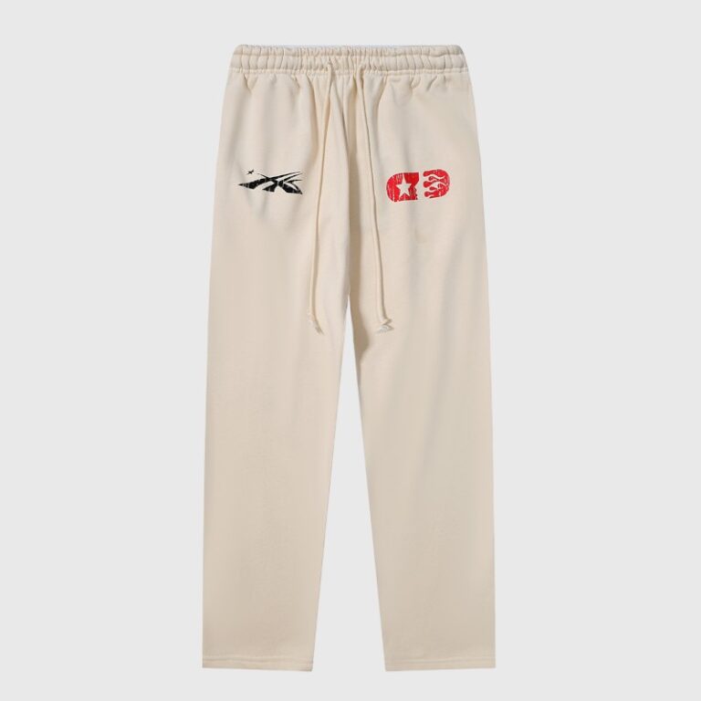 Hellstar If You Don’t Like Us Beat Us beige vintage washed heavyweight fleece sweatpants with graphic prints front view.