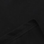 Close-up view of the premium, soft 100% cotton fabric texture of the black Hellstar Inner Peace casual T-shirt.