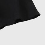 Close-up view of the sleeve detail on the premium black 100% cotton Hellstar Inner Peace graphic T-shirt for men.