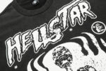 Close-up view of the vintage washed black Hellstar Studios Inner Peace T-shirt with signature white graphic print.