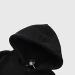 Close-up view of the black Hellstar Jesus Freak Hoodie hood featuring the signature inner brand neck label detail.