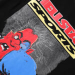 Hellstar Knock Out T-Shirt in black featuring a vintage-washed graphic of a red devil character and bold typography.