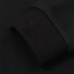 Close-up of the durable ribbed cuff detail on a premium black Hellstar logo print cotton-blend streetwear hoodie.