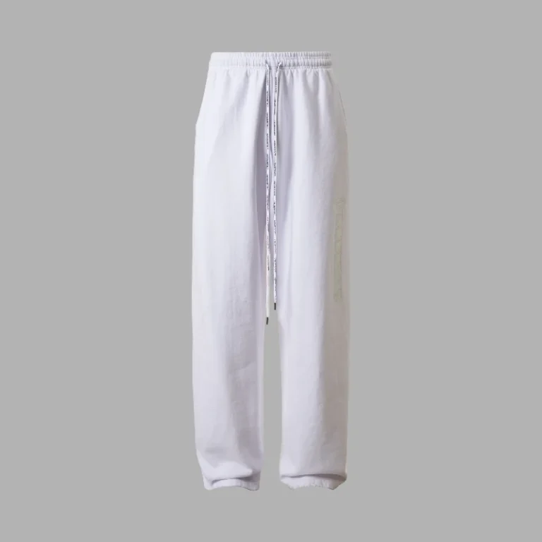 Pair of white Hellstar Marathon sweatpants with a drawstring waist, isolated on a light gray studio background.