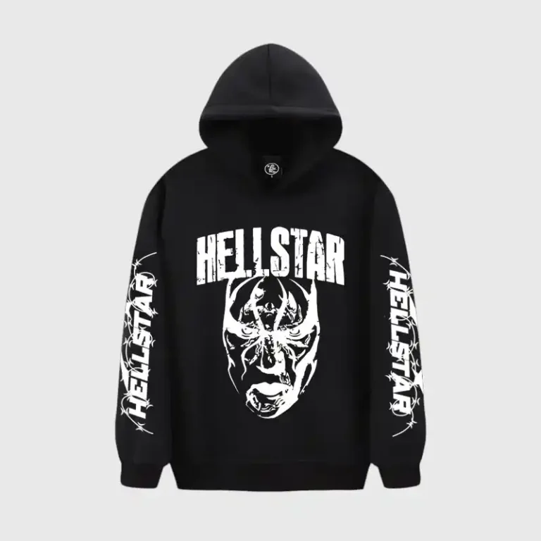 A black Hellstar hoodie featuring a large mask print graphic on the chest and branded sleeves in a streetwear style.