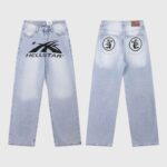 Men's light blue Hellstar denim jeans featuring a graphic logo print on the front and unique circular back pocket art.