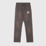 Front view of brown Hellstar Mirror Faced sweatpants with a drawstring waist and a small circular logo graphic.