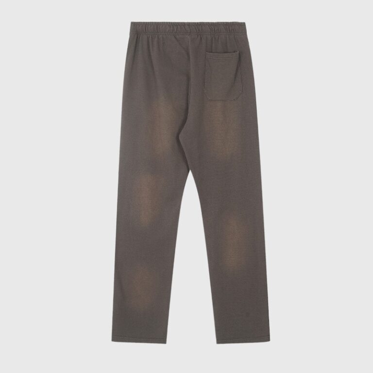 Back view of the Hellstar Mirror Faced sweatpants in grey, featuring a unique reflective and washed vintage aesthetic.