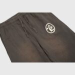 Hellstar Mirror Faced sweatpants in brown with a graphic screen print logo detail and an adjustable drawstring waist.