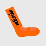 Vibrant orange Hellstar logo crew socks from the neon four pack collection, featuring premium branding for streetwear.