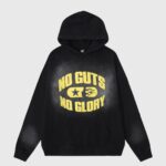 Hellstar No Guts No Glory vintage washed black hoodie with yellow graphic print on the front for streetwear style.