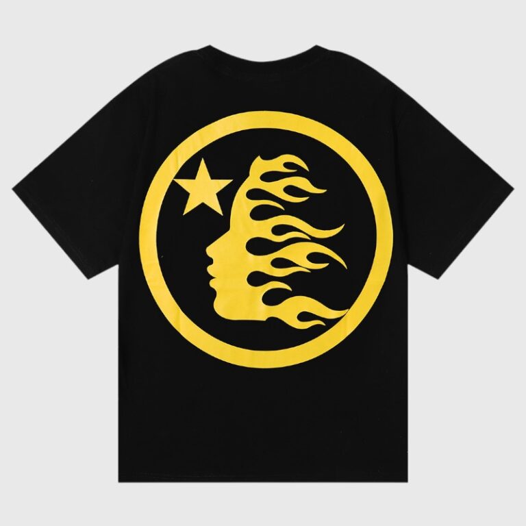 Hellstar No Guts No Glory black tee with bold yellow circular back logo featuring a flaming face profile and star