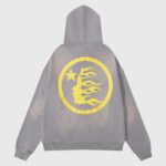 Back view of the grey Hellstar No Guts No Glory hoodie featuring the iconic yellow flaming star head logo.