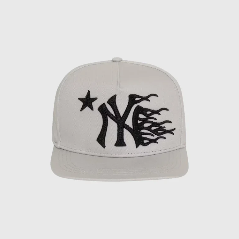 Hellstar NY Snapback Hat in grey featuring an iconic urban logo graphic with a star and flame design, adjustable fit.