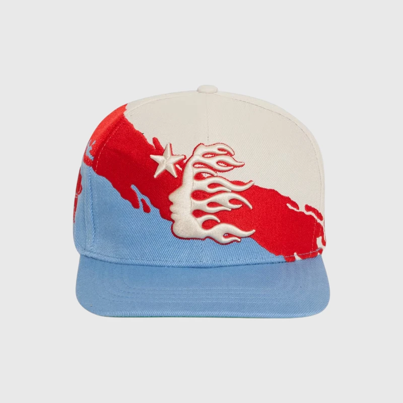 Hellstar Paintbrush Snapback Hat Red Blue Hellstar Paintbrush Snapback Hat in red and blue featuring a unique hand-painted style graphic and iconic logo design.