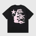 Black Hellstar Paradise Girls T-shirt featuring a unique graphic of a pink flame face design with stars on the back.