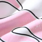 A detailed close-up shot of the soft cotton fabric and unique pink graphic on the Hellstar Paradise Girls T-shirt.