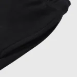 Close-up view of the black pocket detail on the Hellstar Studios Path To Paradise tracksuit pants