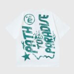 Hellstar Path to Paradise graphic white t-shirt featuring bold green distressed typography and flame design elements.