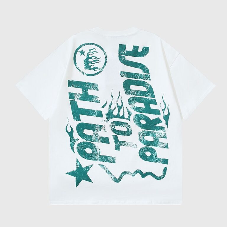 Hellstar Path to Paradise graphic white t-shirt featuring bold green distressed typography and flame design elements.