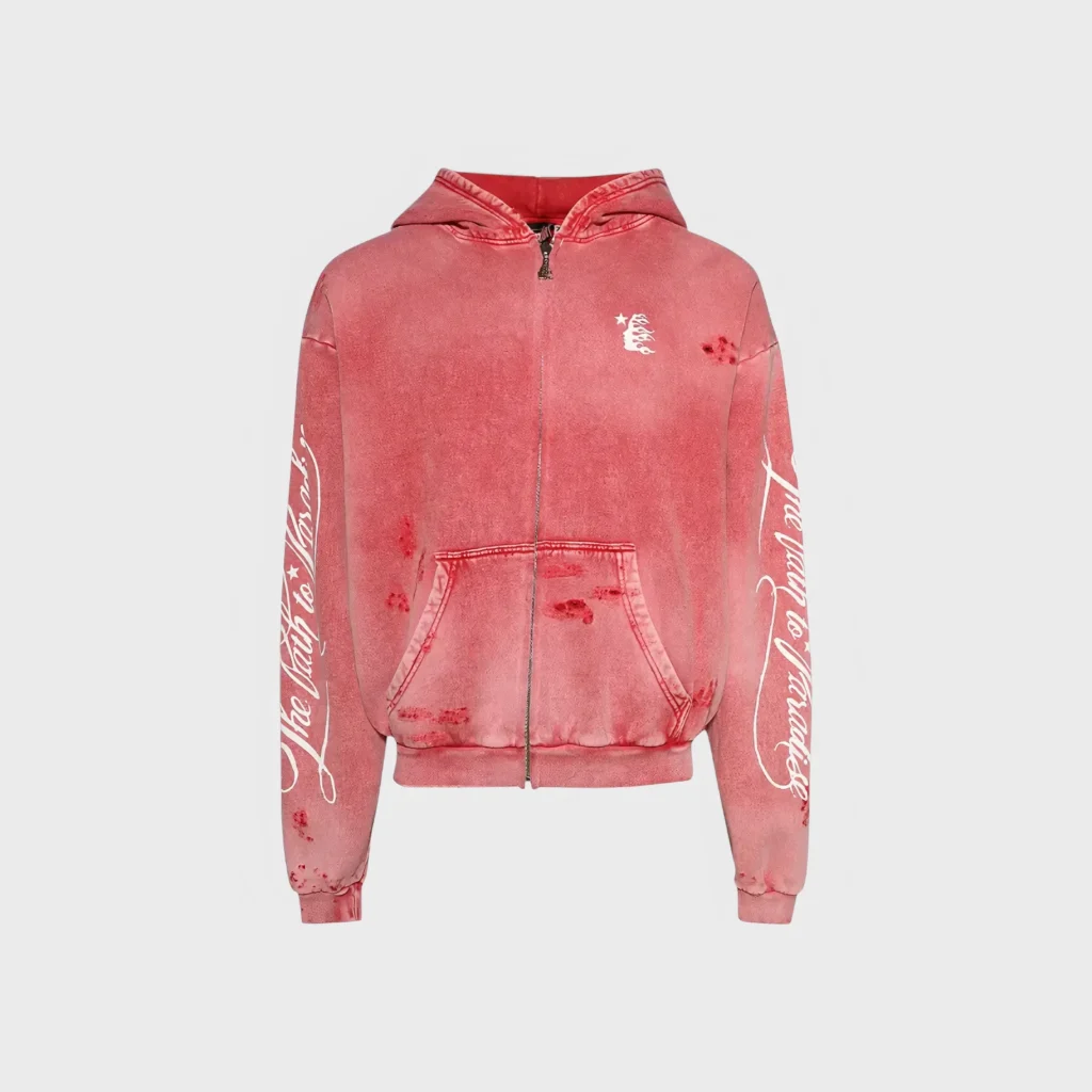 Front view of the red Hellstar Path To Paradise zip-up hoodie featuring white sleeve text and distressed fabric detail.