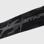 Close-up view of the black Hellstar Studios Path To Paradise tracksuit sleeve featuring signature graphic logo.