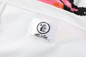 Close-up of the Hellstar Pixel T-Shirt white interior authentication tag with brand logo and printing details