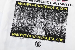 Detailed close-up view of the Hellstar Pixel T-Shirt white fabric featuring the black graphic print and web URL design.