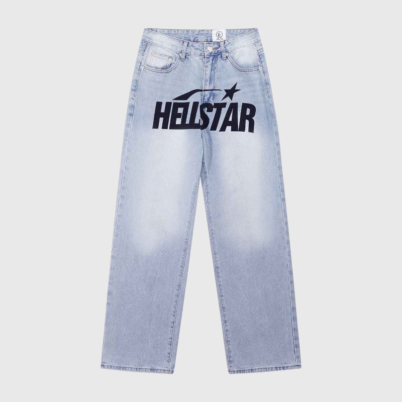Hellstar Print Logo Loose Jeans Front View Front view of Hellstar Print Logo Loose Jeans in vintage washed light blue denim with a bold black graphic logo.