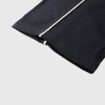 Close-up view of the premium fabric and stitching detail on the black Hellstar Printed Sports T-shirt sleeve.
