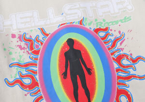 Beige Hellstar Records T-shirt with a detailed vintage graphic print featuring a colorful human silhouette and flames.