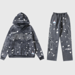 A premium Hellstar Records black tracksuit set featuring a hoodie and matching pants with edgy streetwear graphics.