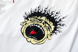 White Hellstar Records Crazy T-Shirt featuring a unique screaming graphic print with black flame-like hair detailing