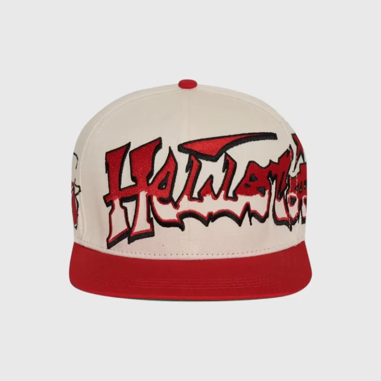 Front view of the red and white Hellstar Records snapback hat featuring embroidered branding and a vintage aesthetic.