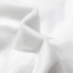Close-up view of the premium white fleece material texture from a Hellstar Records hoodie, showing soft fabric details.
